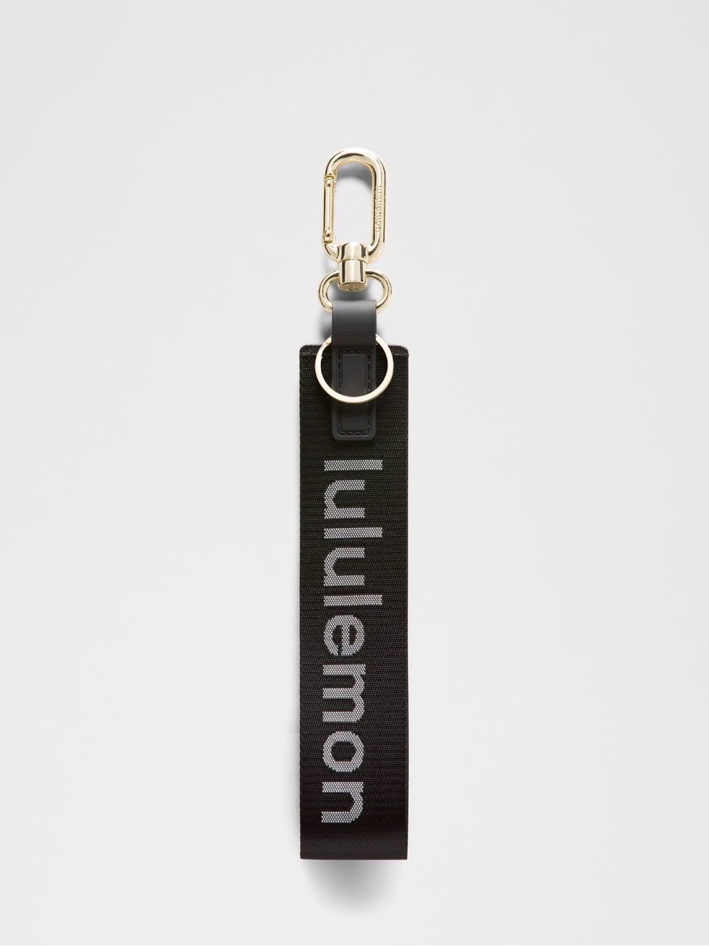 NWT Lululemon Never Lost Keychain in Black/White/Gold